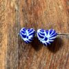 Aretes fe broquel