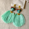 Aretes sagradita pompón turquesa