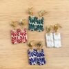 Aretes feliz